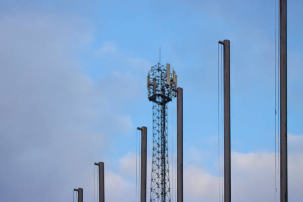 istock Empty Flag Pillars with GSM Antenna in Background 1309037567