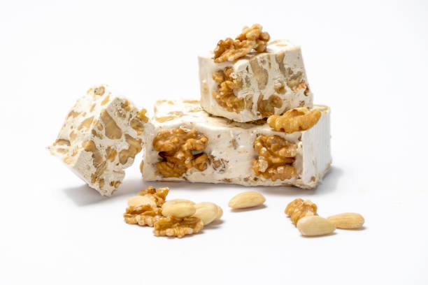 istock Pieces of nougat isolated on a white background 1309037987