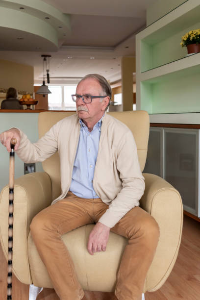 istock Senior Man is Sitting at Home in Deep Thoughts. 1309038793