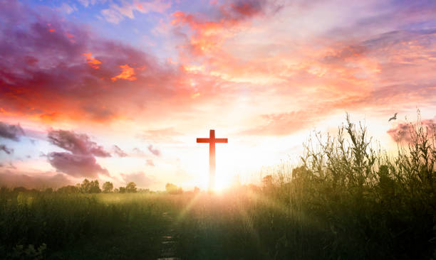 istock Christ Jesus concept: cross in the morning at sunrise 1309038902