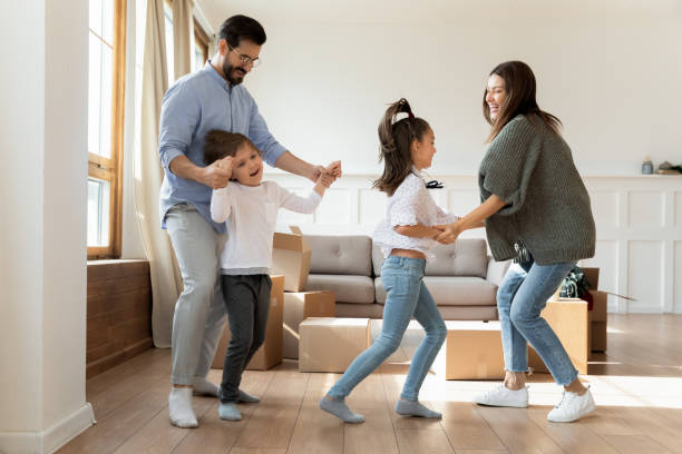 istock Overjoyed family renters with kids celebrate relocation 1309040227