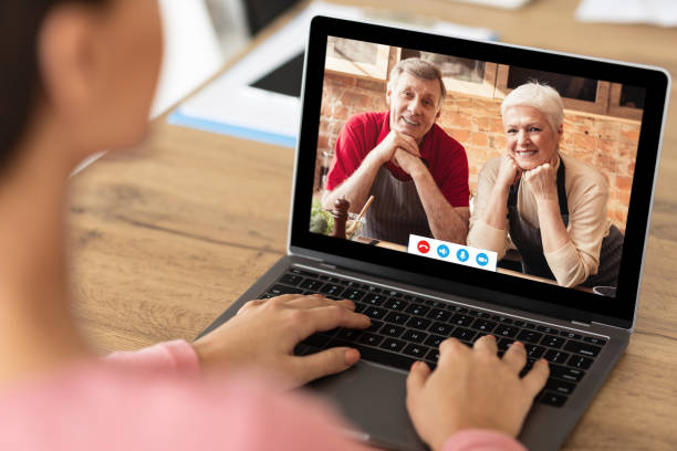 istock Relationship with parents at distance, modern devices and video call conference during COVID-19 pandemic 1309042005