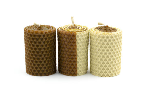 istock Scented wax candles isolated on white background. Honey-scented candles 1309042068