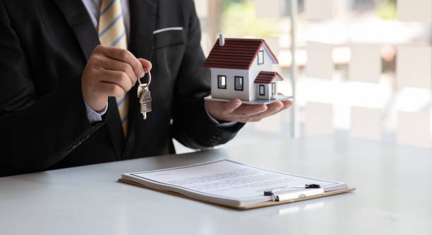 istock Real estate broker agent presenting and consult 1309046484