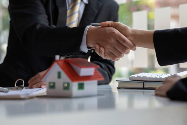 istock Real estate broker agent presenting and consult 1309046501