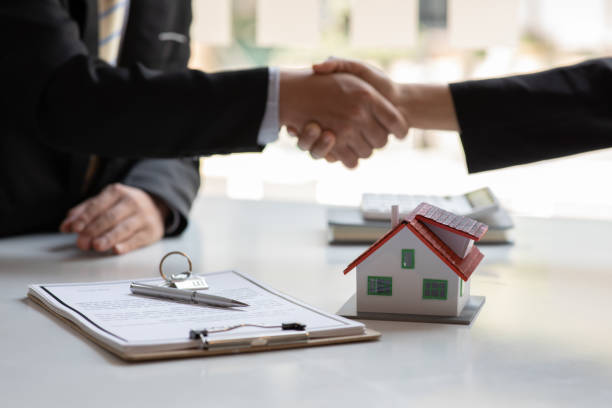 istock Real estate broker agent presenting and consult 1309046519