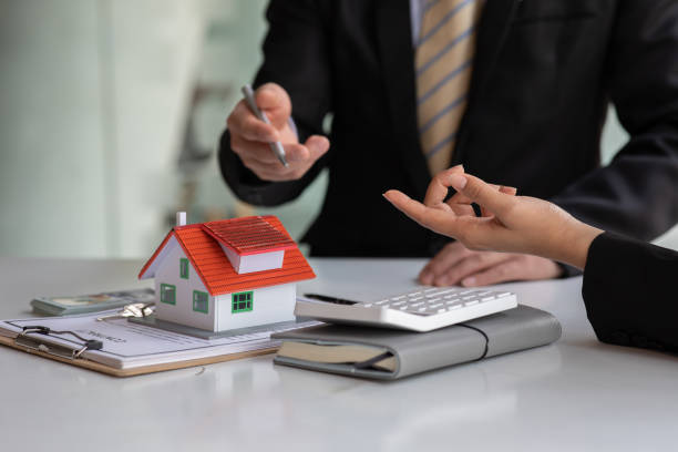 istock Real estate broker agent presenting and consult 1309046529