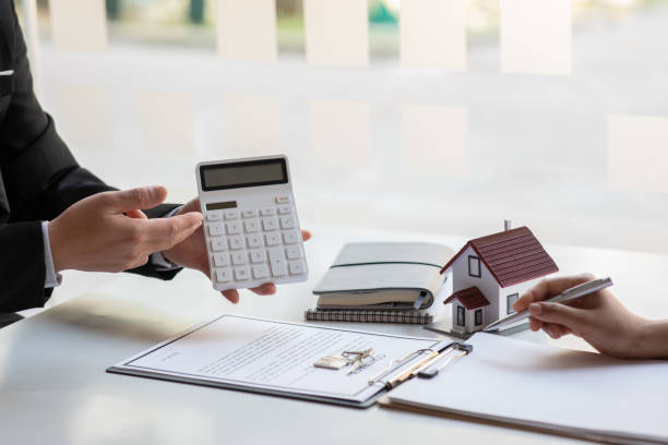 istock Real estate broker agent presenting and consult 1309046608