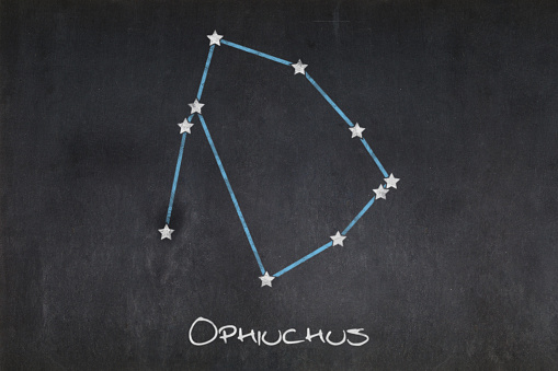 Blackboard with the Ophiuchus constellation drawn in the middle.