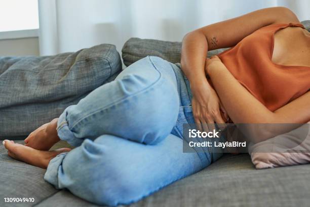 I Must Have Ate Something Bad Stock Photo - Download Image Now - Menstruation, Stomachache, Abdomen