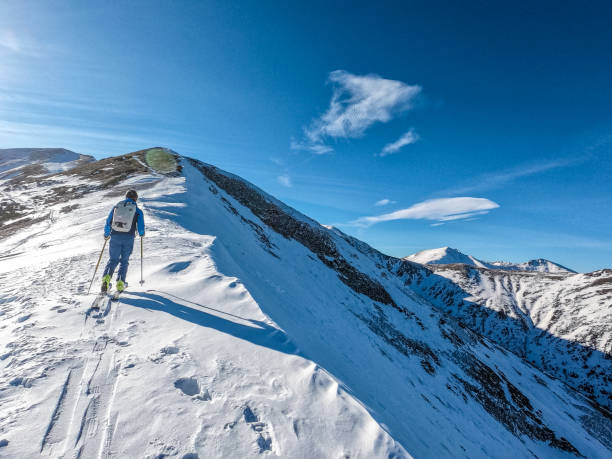 istock Ski touring in the mountains. Deep snow on sunny day 1309049537