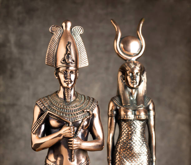 istock Egyptian Pharaoh Tutankhamun and Isis on a brown background. 1309052646
