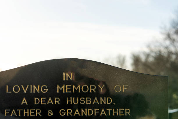 istock Gravestone for father husband and grandfather 1309052679