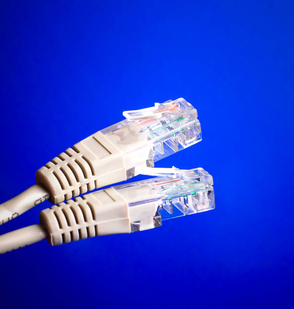 Power cord on a blue background. Internet wire.
