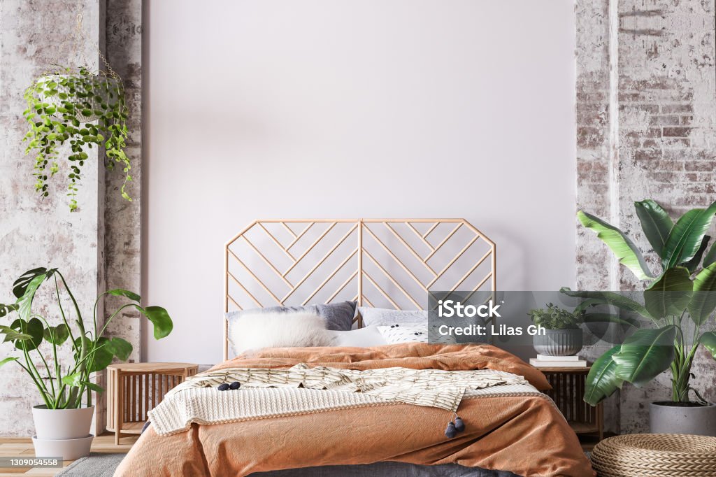 Wooden bed in loft apartment design, interior of bedroom with empty wall mockup Wooden bed in loft apartment design, interior of bedroom with empty wall mockup, 3d render Bedroom Stock Photo