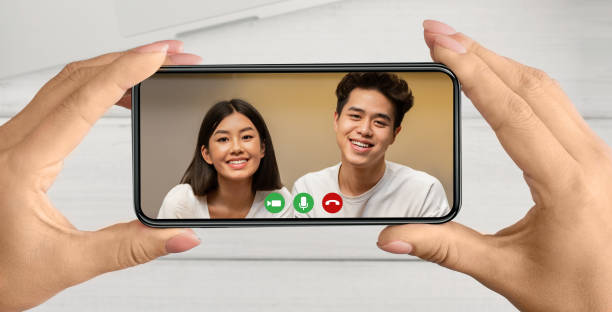 istock Communicate online on covid-19 quarantine, video chat with family using webcam, call from son and daughter 1309055874
