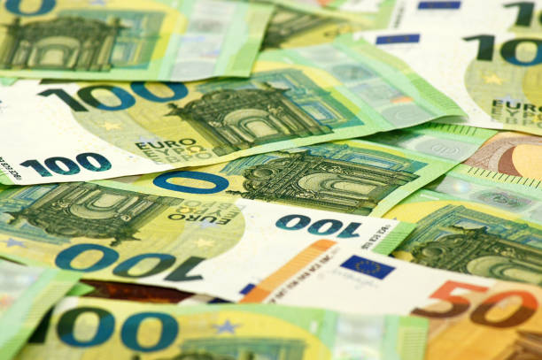 istock Euro banknotes as a background 1309058502