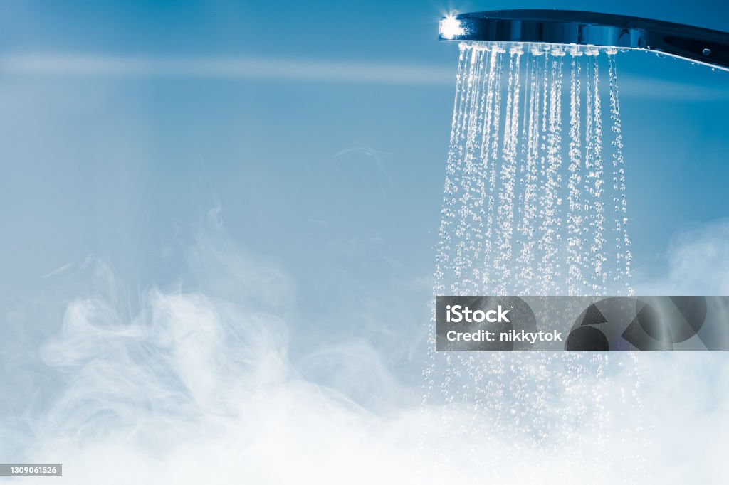 shower with flowing water and steam Shower Stock Photo