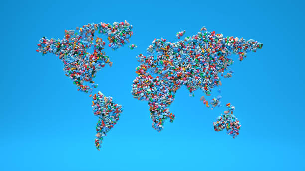 istock Scattered many pills world map shape on blue background 1309063457