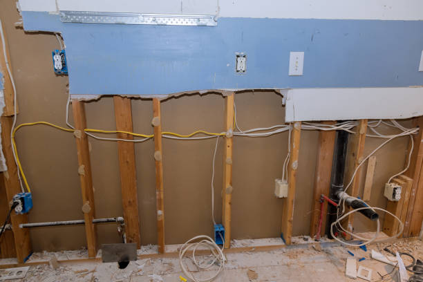 istock Demolition taking place at kitchen a full remodel the old wall has been removed plumbing for sink 1309067215