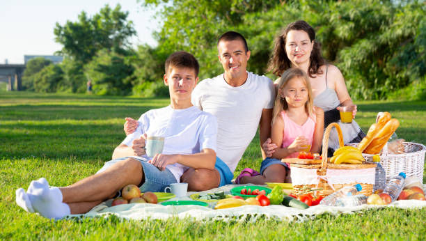 istock Happy family on picnic 1309069804