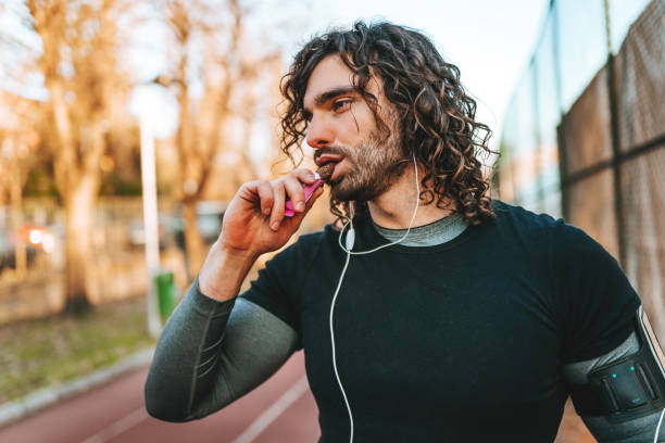 istock Man sport - protein bar 1309073015