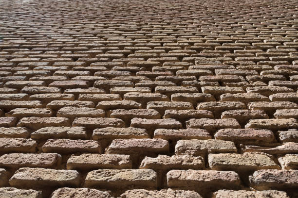 istock Wall of yellow bricks with cement layers Tudela Spain 1309076256