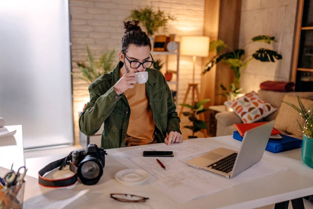 istock Young freelancer working at home on laptop 1309078292