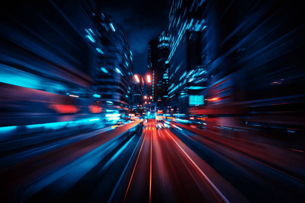 istock Motion Speed Light Tail with Night blurred City Background 1309080934