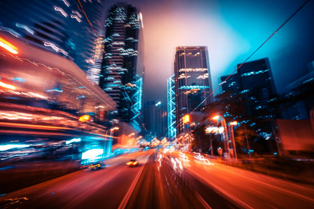 istock Motion Speed Light Tail with Night blurred City Background 1309081127