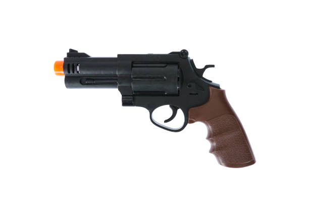 pistola de juguete de plástico para niños. armas de juguete - gun turret fotografías e imágenes de stock