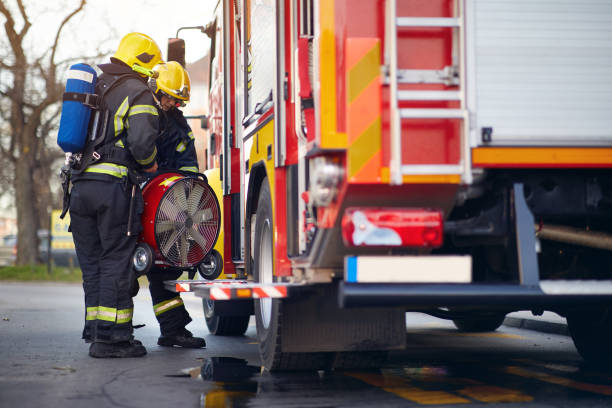 istock Fireman  pack equipment on the fire truck.firefighter  successfully completed the firefighting 1309087085