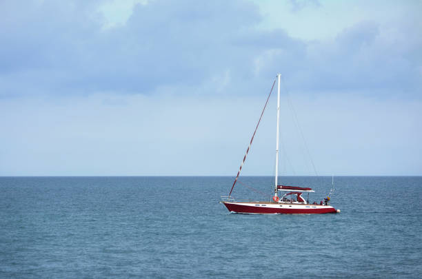 Small red and white yacht in the Black Sea