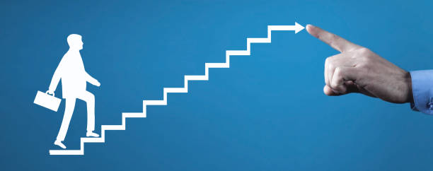 istock Businessman climbing on career ladder. Personal development. Career growth 1309088305