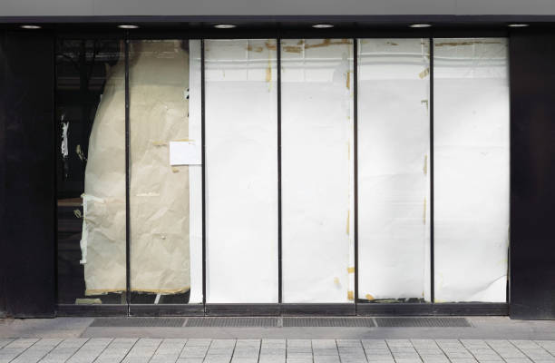 istock closed or empty shop or store storefront with blocked windows 1309088581
