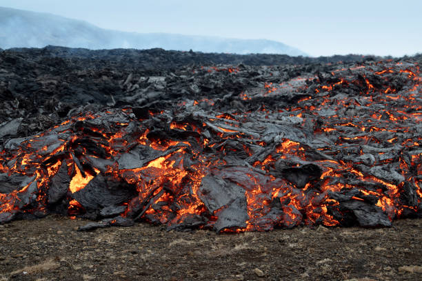 Fiery flowing lava. Volcano eruption at Fagradalsfjall, Iceland. stock photo
