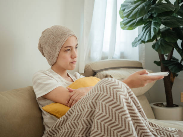 istock Woman with cancer conquering adversity 1309091707