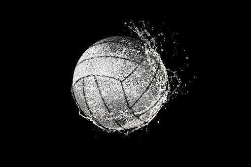 This is a close up photo of a white leather volleyball isolated on a white background