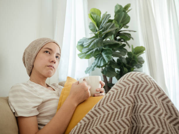 istock Woman with cancer conquering adversity 1309092255