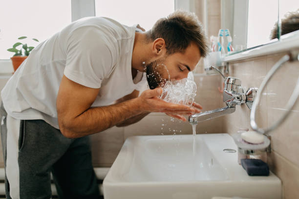 istock Beautiful young man getting ready in the morning 1309092361