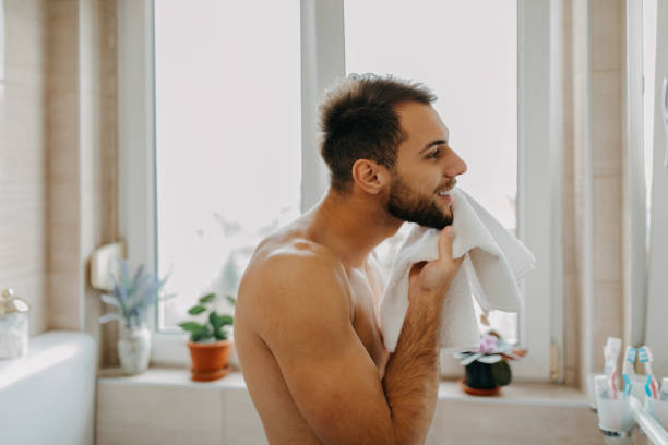 istock Beautiful young man getting ready in the morning 1309092378