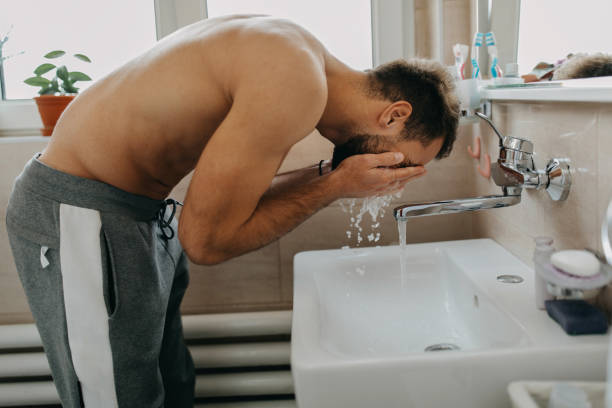 istock Beautiful young man getting ready in the morning 1309092451