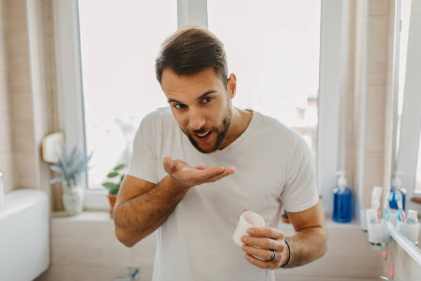 Beautiful young man getting ready in the morning