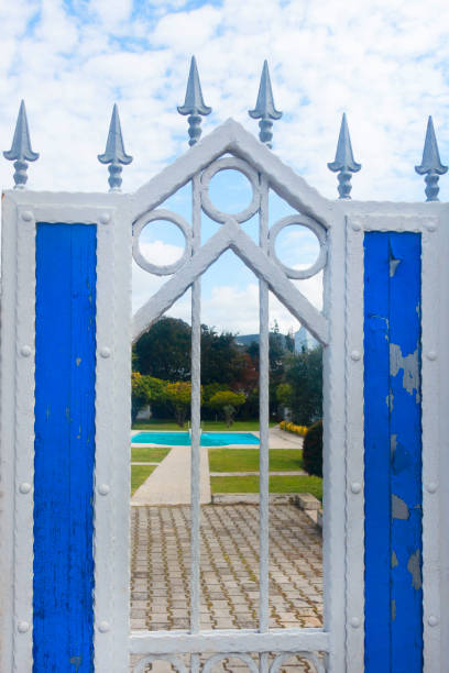 istock Blue and white Wooden gate , close up 1309093292