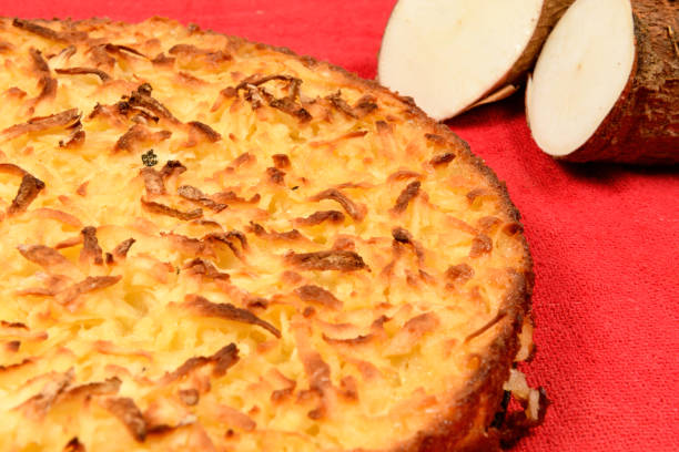 istock Whole cassava cake on red fabric background 1309093610