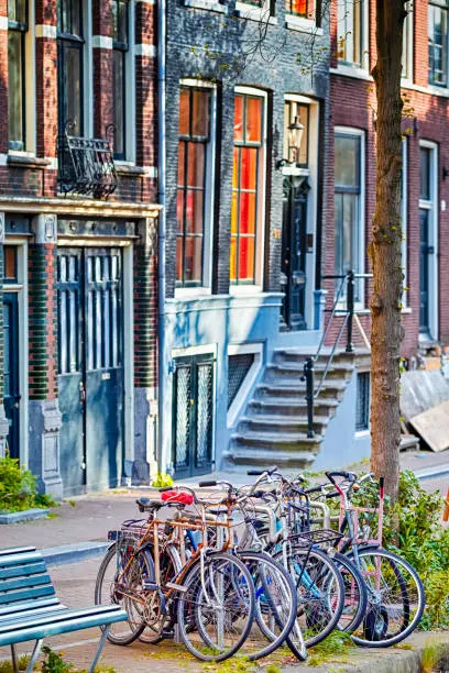 Photo of Line of Traditional Bicycles in Amsterdam in the Netherlands. Vertical Image