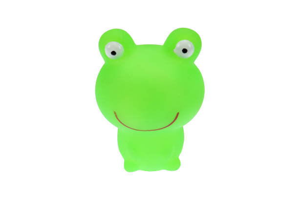 istock Green toy frog. On a white background, isolated. 1309105821