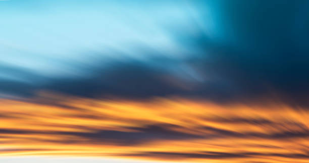 istock Long exposure clouds on the sunset sky. Nature sky clouds background. 1309106548