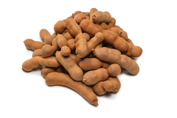 istock Sweet tamarind isolated on white background. 1309107140