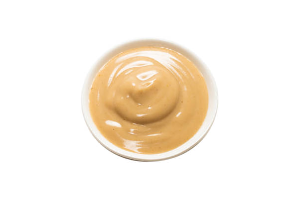 istock Mushroom sauce in a bowl isolated on white background. 1309107190